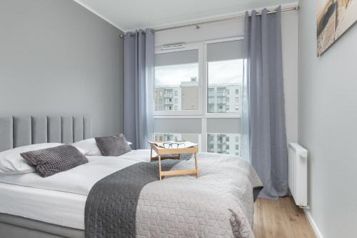 Nowa Letnica Comfortable Apartments with Balcony & Parking Gdańsk by Noclegi Renters
