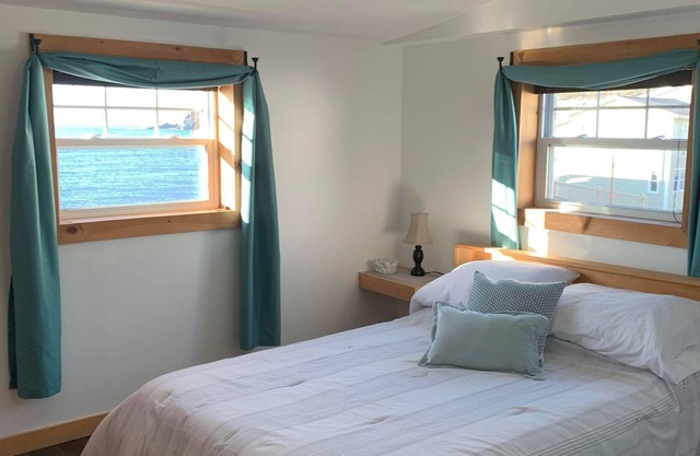 Ocean Breeze offers modern amenities in a renovated saltbox house.