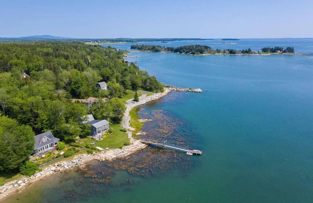 Ocean front, arts and crafts style family compound includes all amenities.
