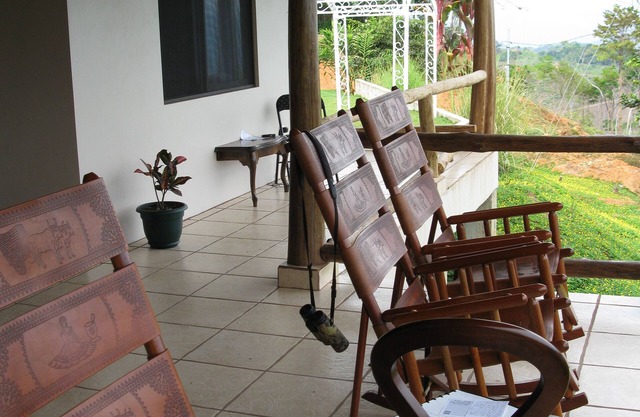 Ocean & mountain vistas, from the porches of this modern jungle perched villa.