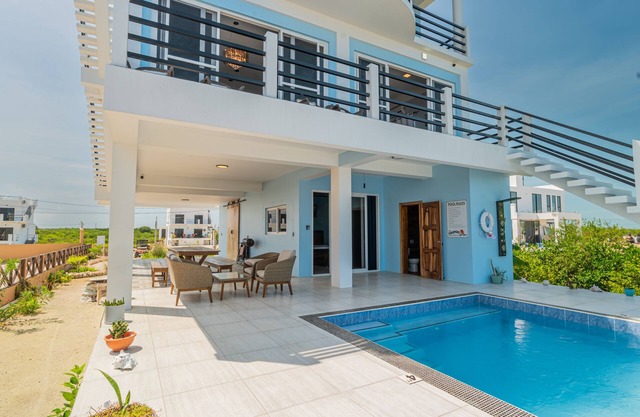 Ocean view retreat with a large balcony, luxe walk-in shower, kitchenette, & AC