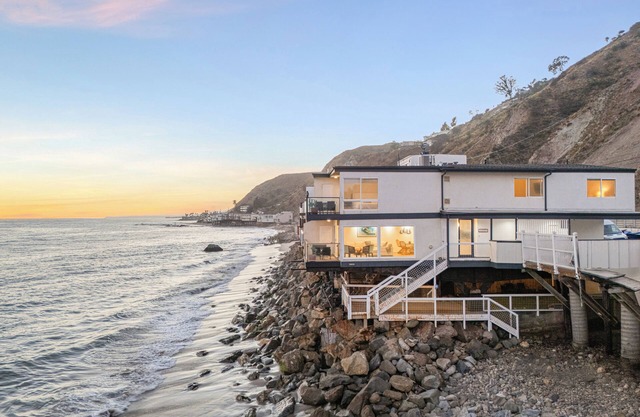 Oceanfront Retreat with Multiple Balconies, Direct Beach Access & Sweeping Views