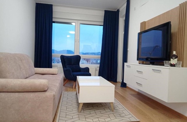 One Bedroom Apartment with Balcony and City View