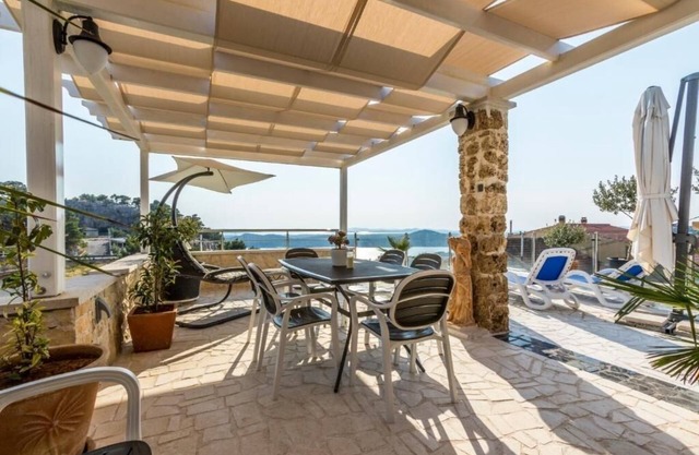 One bedroom apartment with terrace and sea view Šibenik (A-22457-b)