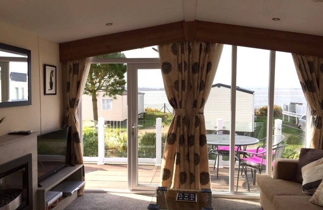 Orchid - dog friendly with sea view on Rockley Park, Poole
