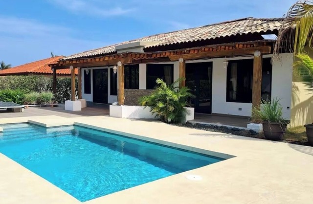 Paradise welcomes you ! Private pool & access to beach club and miles of beach !