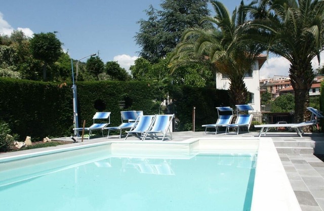 Part of a villa with pool.