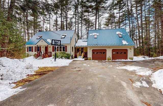 Peaceful lakefront retreat with private hot tub, game room, & deck - near skiing