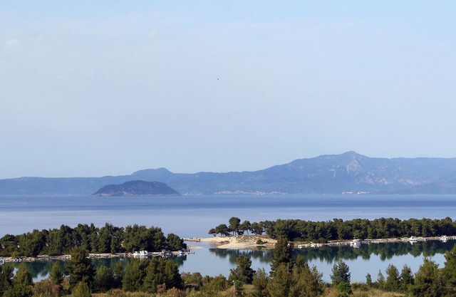 Pefkochori villa with a stunning panoramic view and a waterfall private pool.