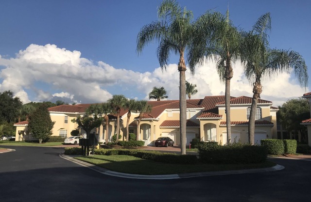 Pelican Bay, Lambiance Garden Condo, second floor with full lake western view.
