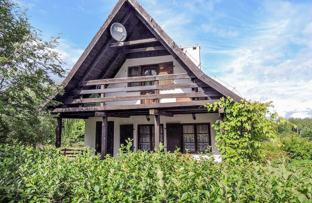 Practically furnished vacation home with private garden in idyllic surroundings near Lake Symsar.