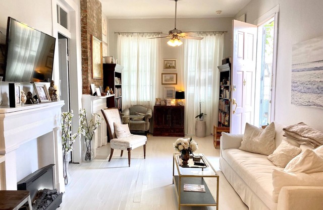 Pristine 1880s Uptown Victorian Shotgun Cottage with Weekly Housekeeper