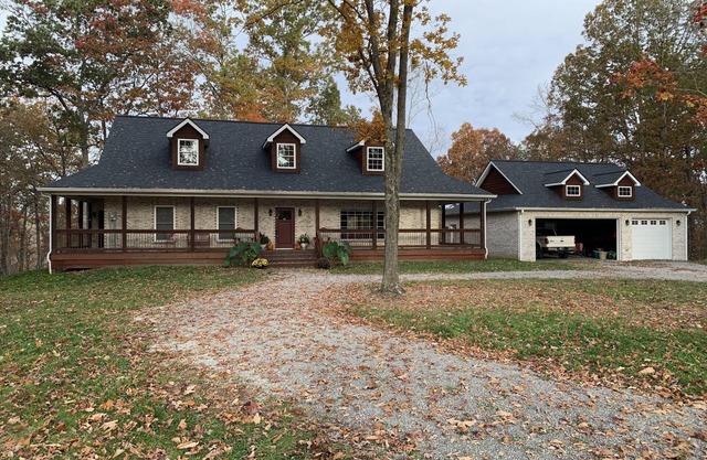 Private brick home in the woods near lake