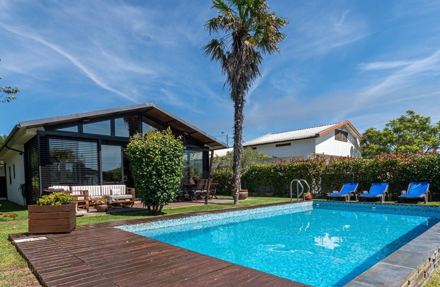 Private house with heated private swimming pool.