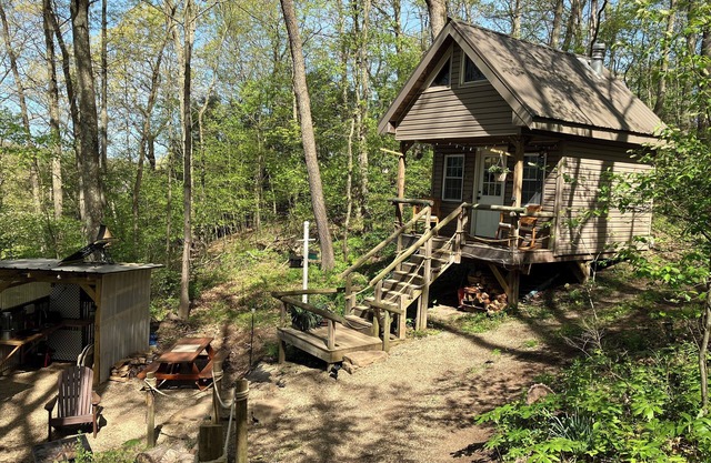 Private off grid cabin nestled on 40 acres at historic Camp Bouquet