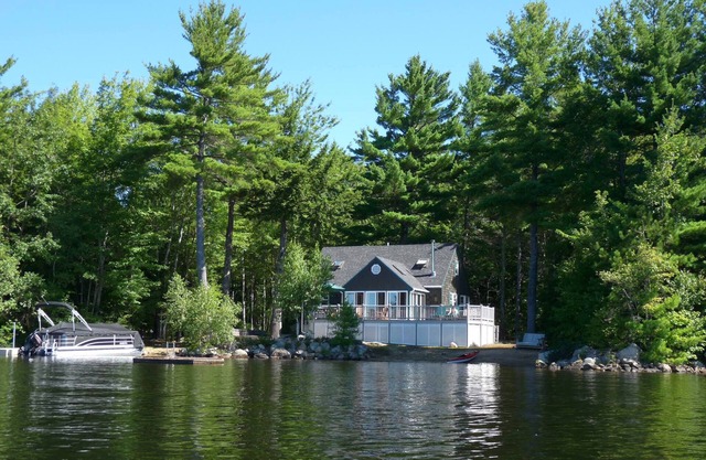 Private Peninsula, 600’ Of Waterfront + Sandy Beach on Sunrise Lake