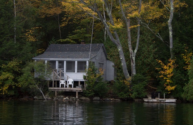 Private three season cabin nestled in woods on shore of pristine Maine lake