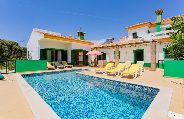 Private villa with 6 suites and heated pool