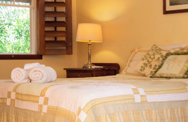 Queen-size bed, with a private bathroom, a walk-in shower and closet.