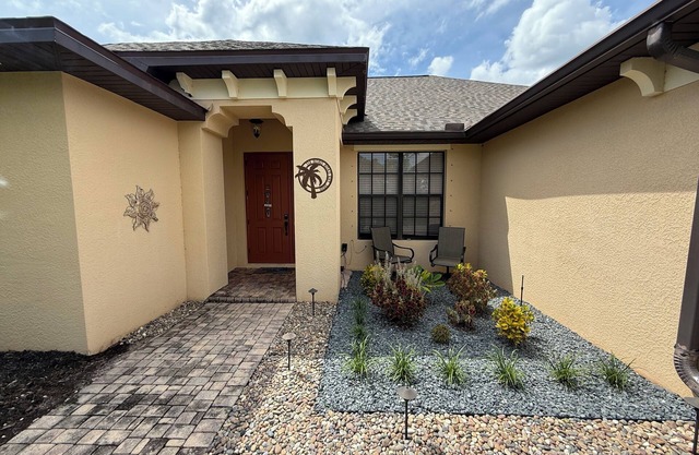 Quiet neighborhood and heated pool. 4 bedroom, three bathroom home.