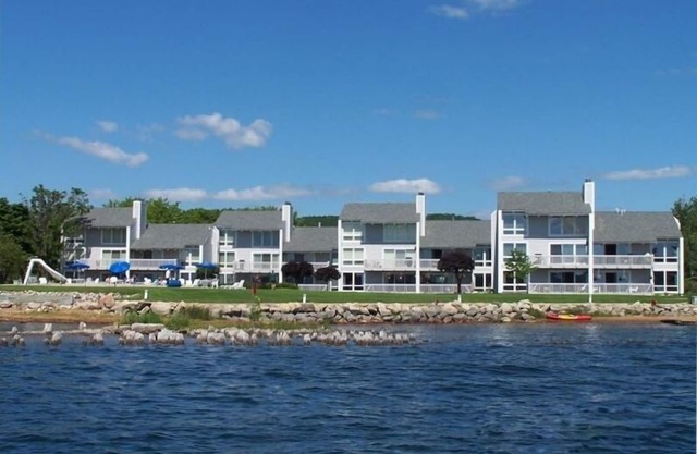 RECENTLY REMODELED directly on Lake Charlevoix Boat Slip Pool Deck Walkout Wifi