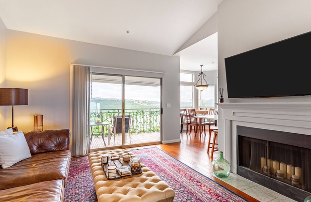Recently Remodeled Top Floor Condo W/Great Hill Country Views & Private Garage!