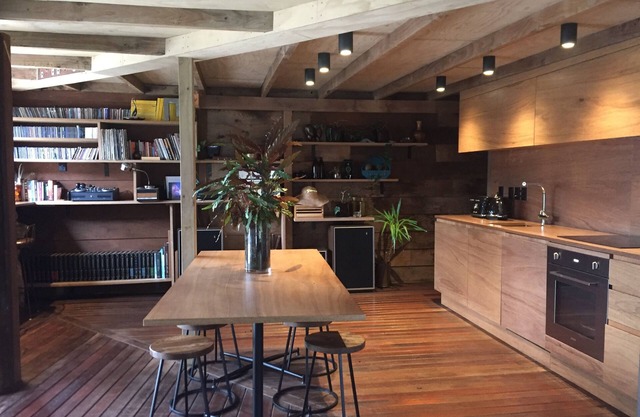 Relax in our Muriwai Sanctuary amongst the trees.