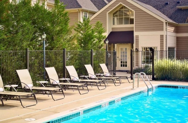 Relax in Spacious Suite with Full Kitchen and Seasonal Swimming Pool