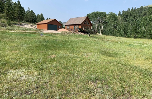 Remote off-grid cabin. Comfortable modern interior on 60 acres.
