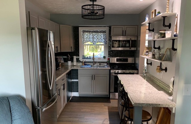 Renovated 2 bedroom / 1 bathroom house with large garage.