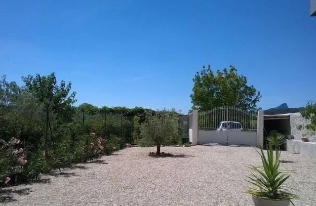 Renovated contemporary style house in small village, view of Pic Saint Loup