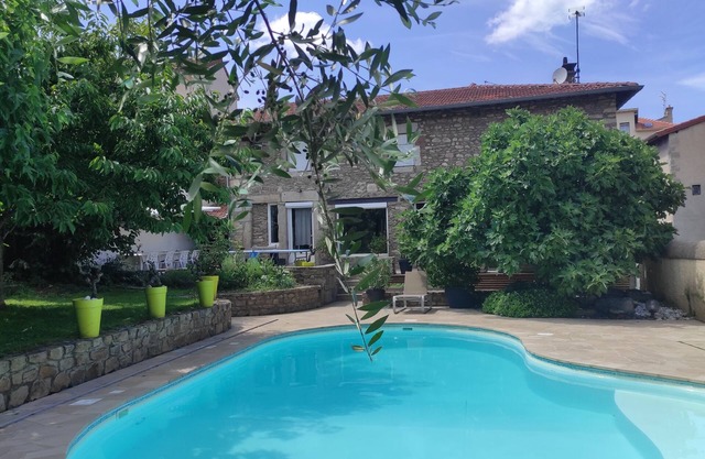 Renovated farmhouse in village with swimming pool, sauna, Nordic bath and hanging net
