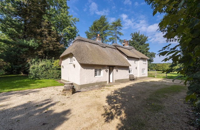 River cottage sits in a pretty rural setting with its own enclosed garden