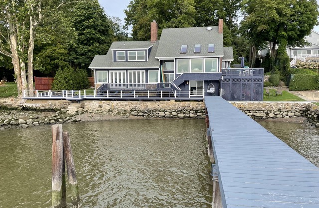 River front with large decks and dock over the Hudson