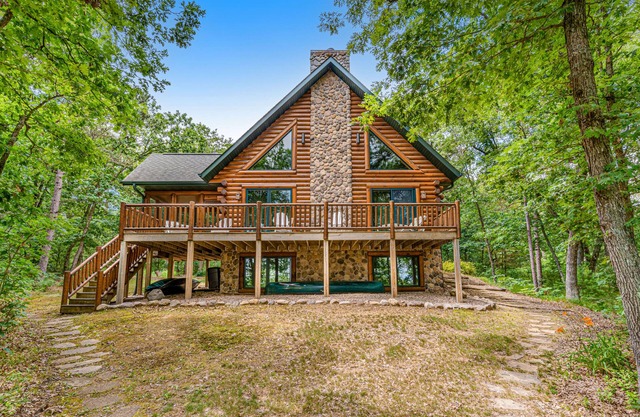Riverfront cabin with a dock, kayaks and a canoe - firepit and water views