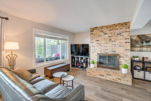 Riverfront Champlin Townhome with Deck and Water View!