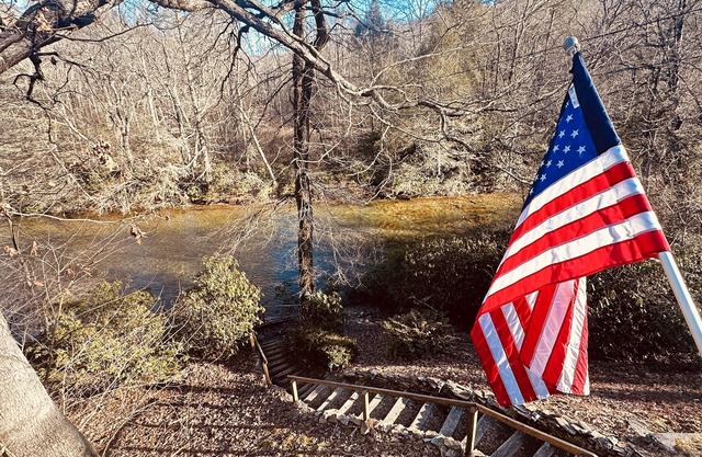 Riverfront direct access to trout river with tranquil views