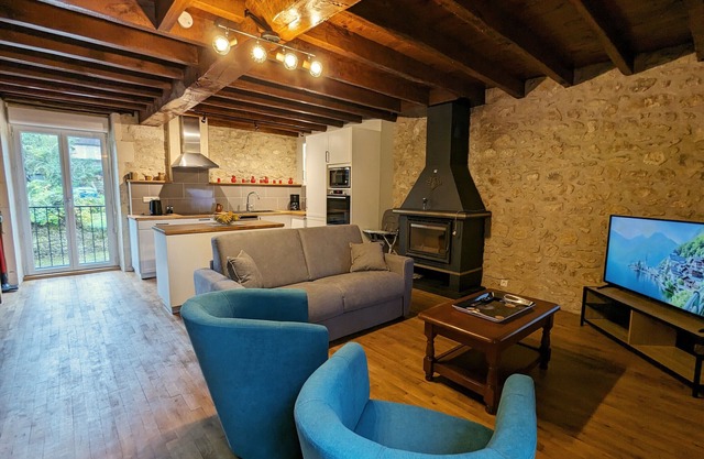 Riverside Retreat: Historic Watermill with Private Terrace, Fireplace, and Scenic Views in Brenne Park
