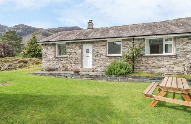 ROCK COTTAGE, character holiday cottage, with open fire in Keswick
