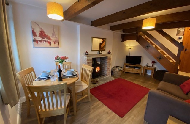 Romantic Cottage for two In Monyash, with exposed beams and log-burning stove.