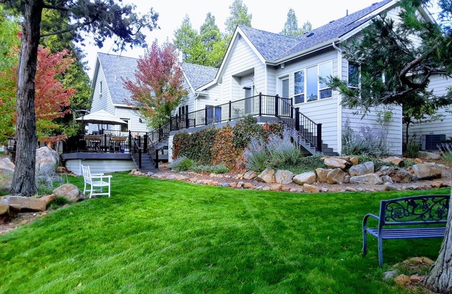 Running Y custom single level home with large deck for relaxing.