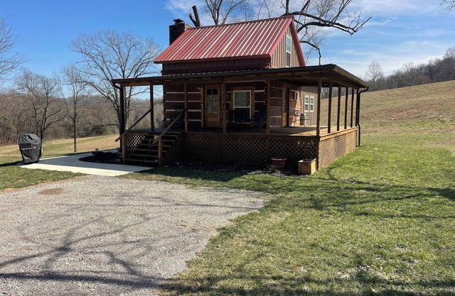 Rustic 2-bedroom cabin in charming Pulaski, TN situated on 40 beautiful acres.