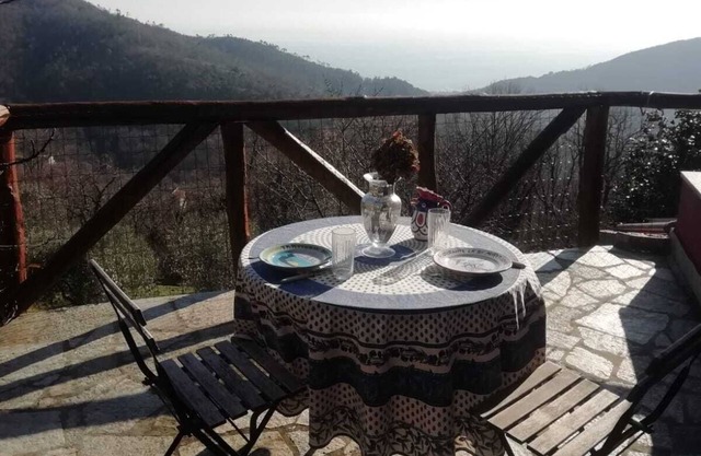 Rustic country house in the middle of nature with a view of the sea