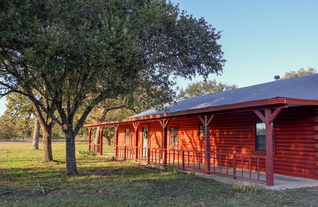 Rustic Log Cabin Near Texas A&M – Spacious Retreat with Pond & Firepit!