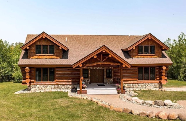 Rustic log home with lots of room to relax.