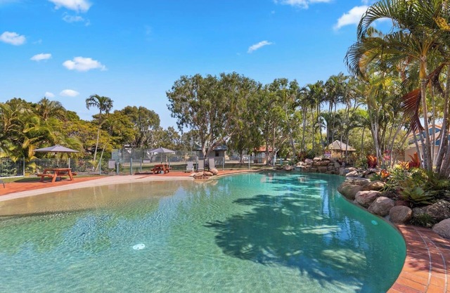 Sandy Straits Poolside Escape with Beach Access