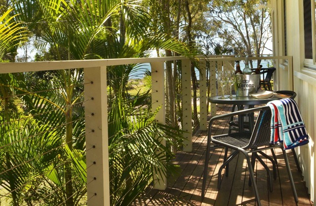 Sea Breeze & partial Water Views among the palm tree canopy -Apt 4.