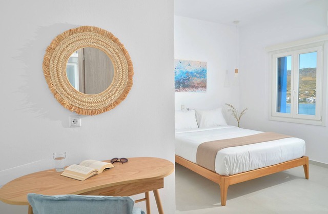 Sea-side Villa Hydroussa by Andros Homes, ideal for a relaxing retreat.