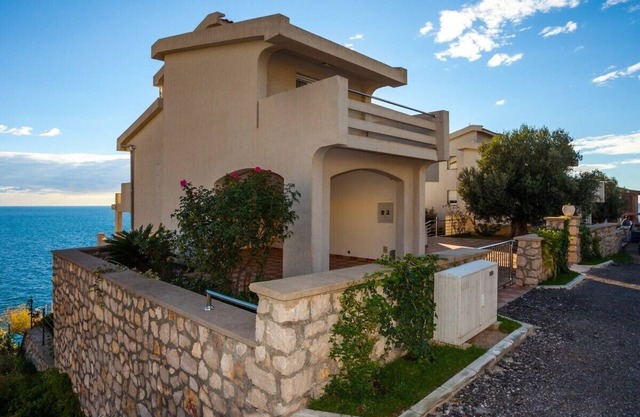 Seafront villa with pool