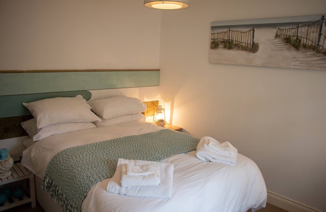 Seashells. The Beach House central apartment with parking